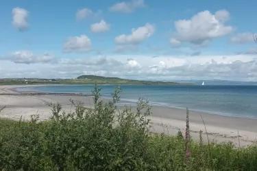 a landscape photo of a beach