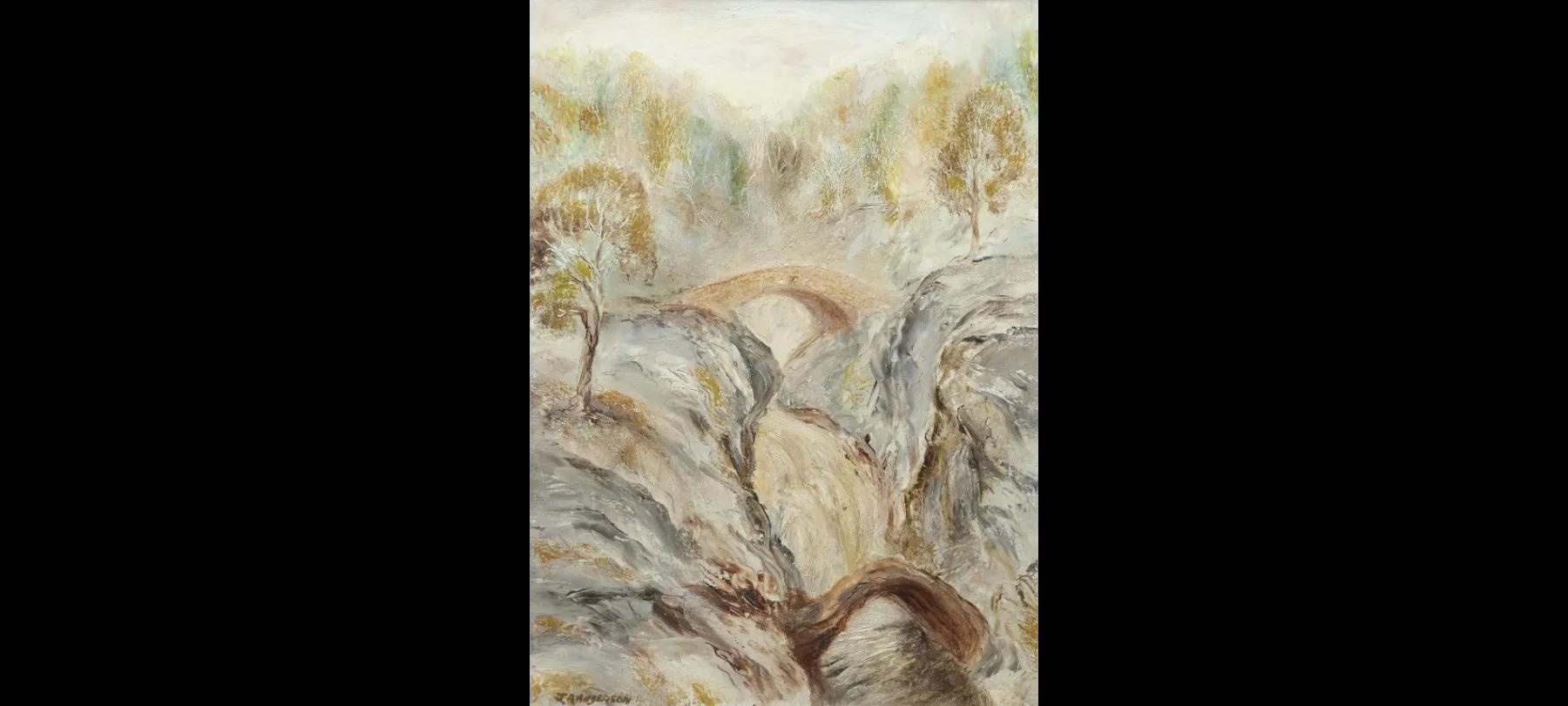 a landscape showing rough rocks, divided by a stream and connected with a bridge, a forest in the background underneath a blue sky.