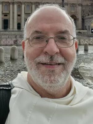 Andrew smiling at the camera