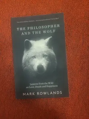 The front and back cover of the book "the philosopher and the wolf"