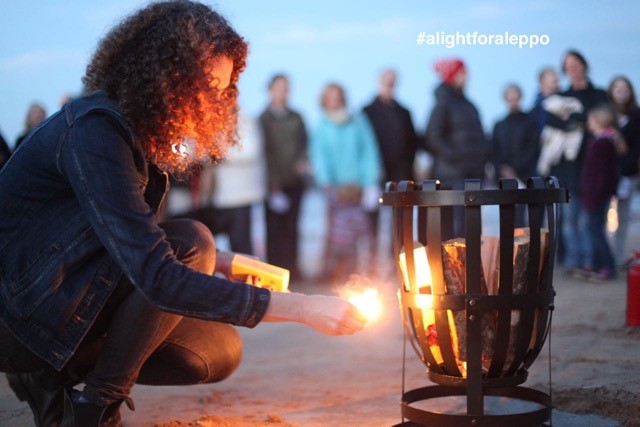 Image of a brazier being lit on North Berwick beach