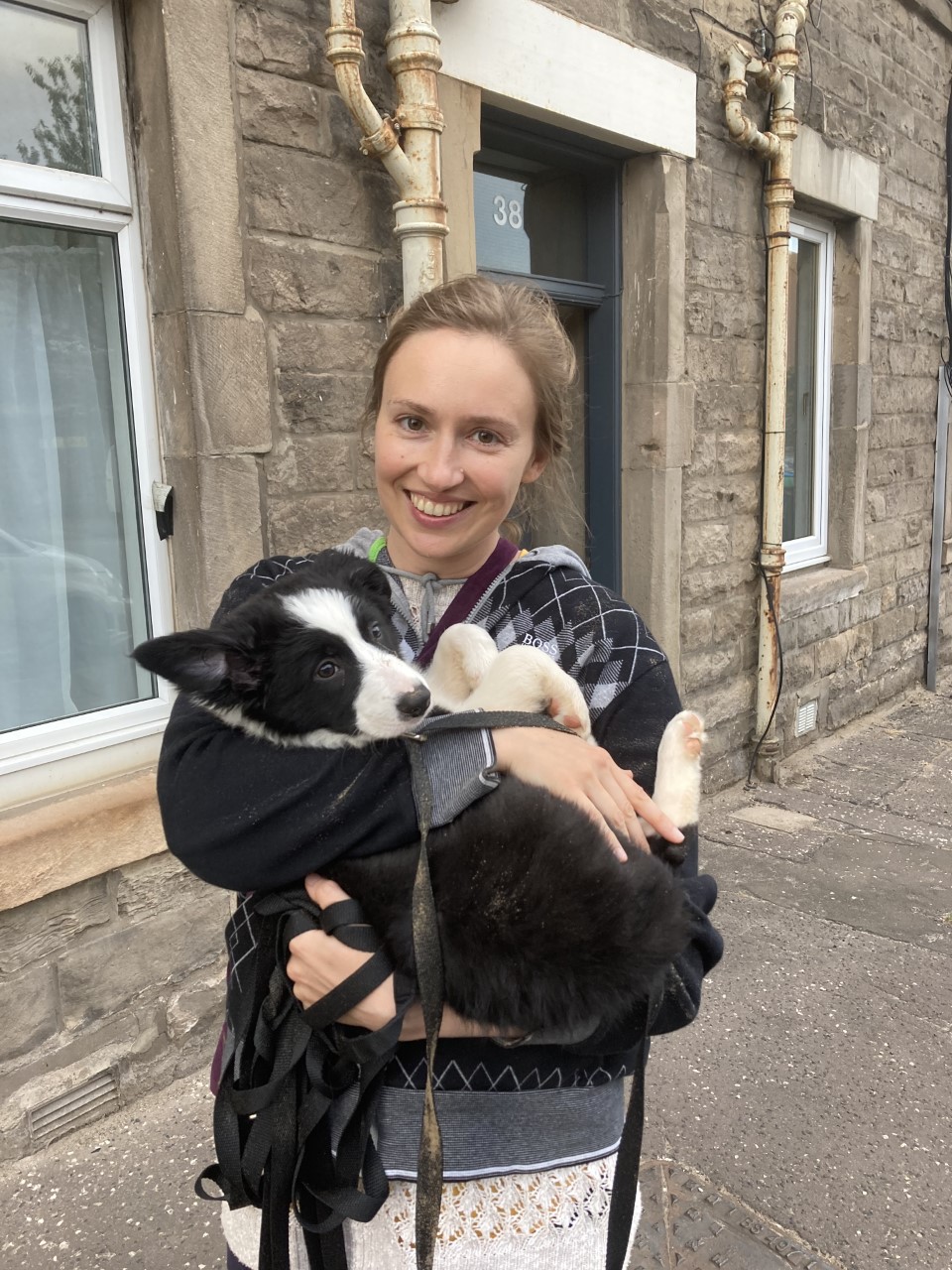 Mindfulness Chaplain holding her new puppy